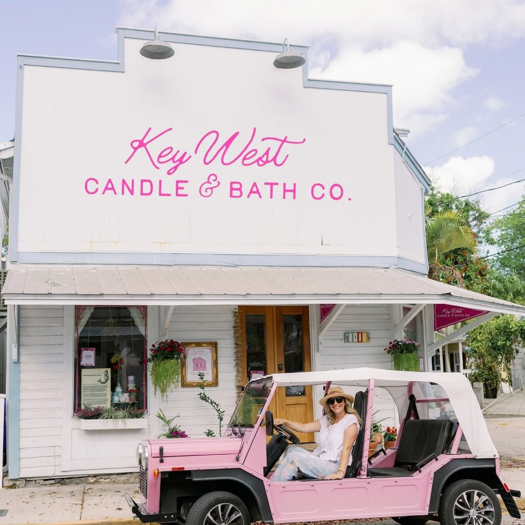 A pink Moke parked outside a Key West shopfront