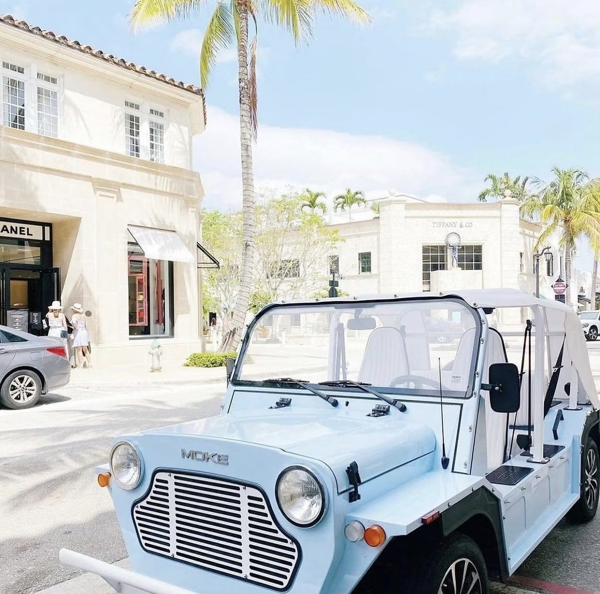 A white Moke parked on Worth Avenue in Palm Beach